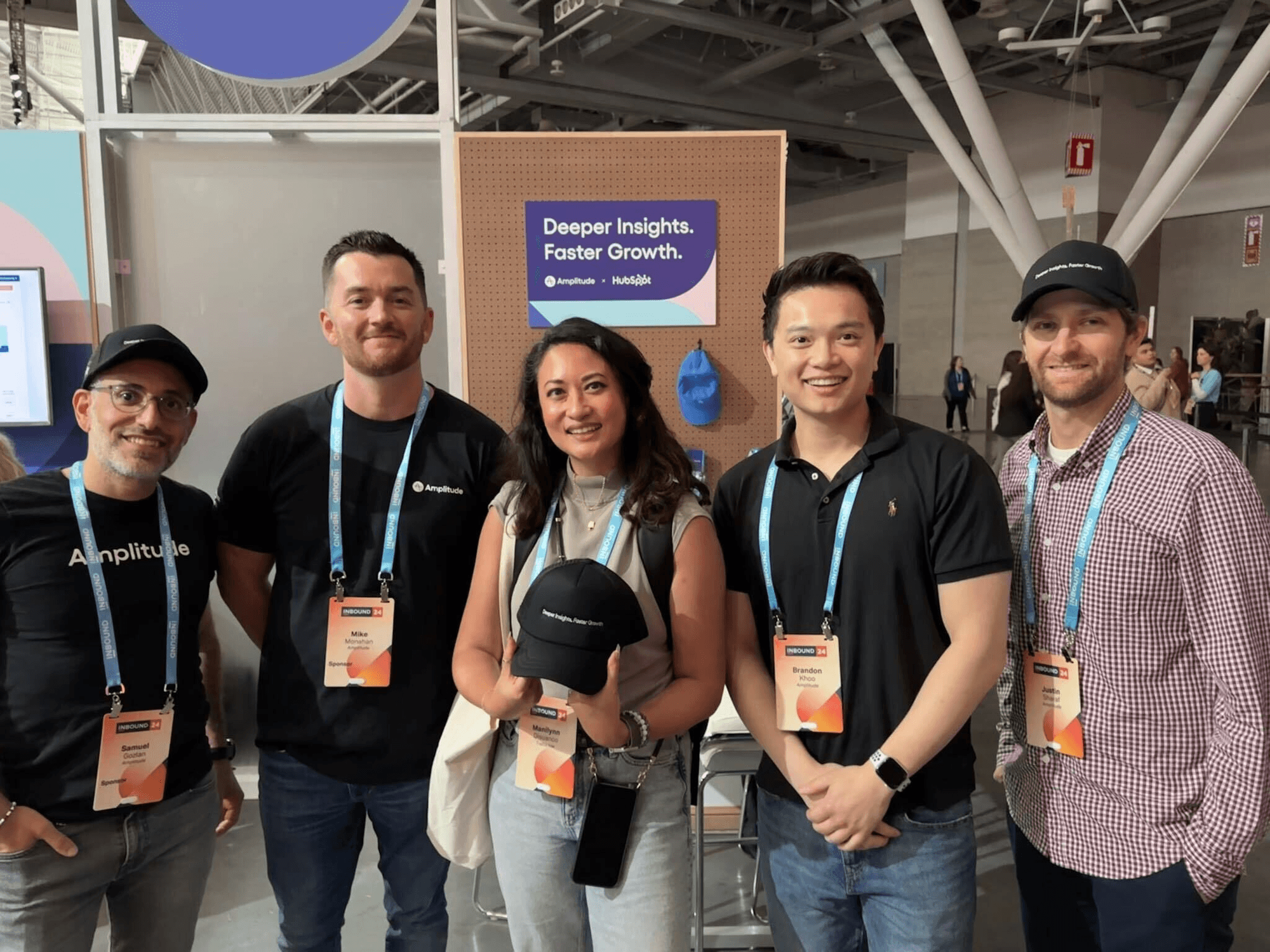 Team at HubSpot Inbound 2024 at the Amplitude x HubSpot booth